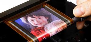 Wicked Cool Futuristic Roll-Up Screen (Thickness of a Human Hair!)