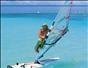 Do a sail and body 360 when windsurfing