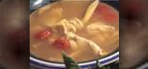 Make tom yum kai Thai hot & sour chicken soup w/ Kai