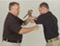Defend against an overhead attack with an edged weapon - Part 4 of 9
