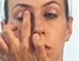 Create a pink eyeshadow and black eyeliner makeup look