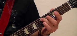 Play "Satisfaction" by the Rolling Stones on the electric guitar