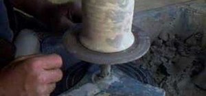 Tap into the center of a pottery wheel