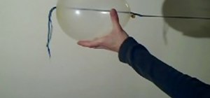 Insert a needle in a inflated balloon without popping
