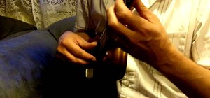 Play finger-style tremolo on the ukulele
