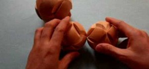 Solve the wooden ball puzzle