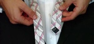 Tie a necktie with a Pratt (or Shelby) knot