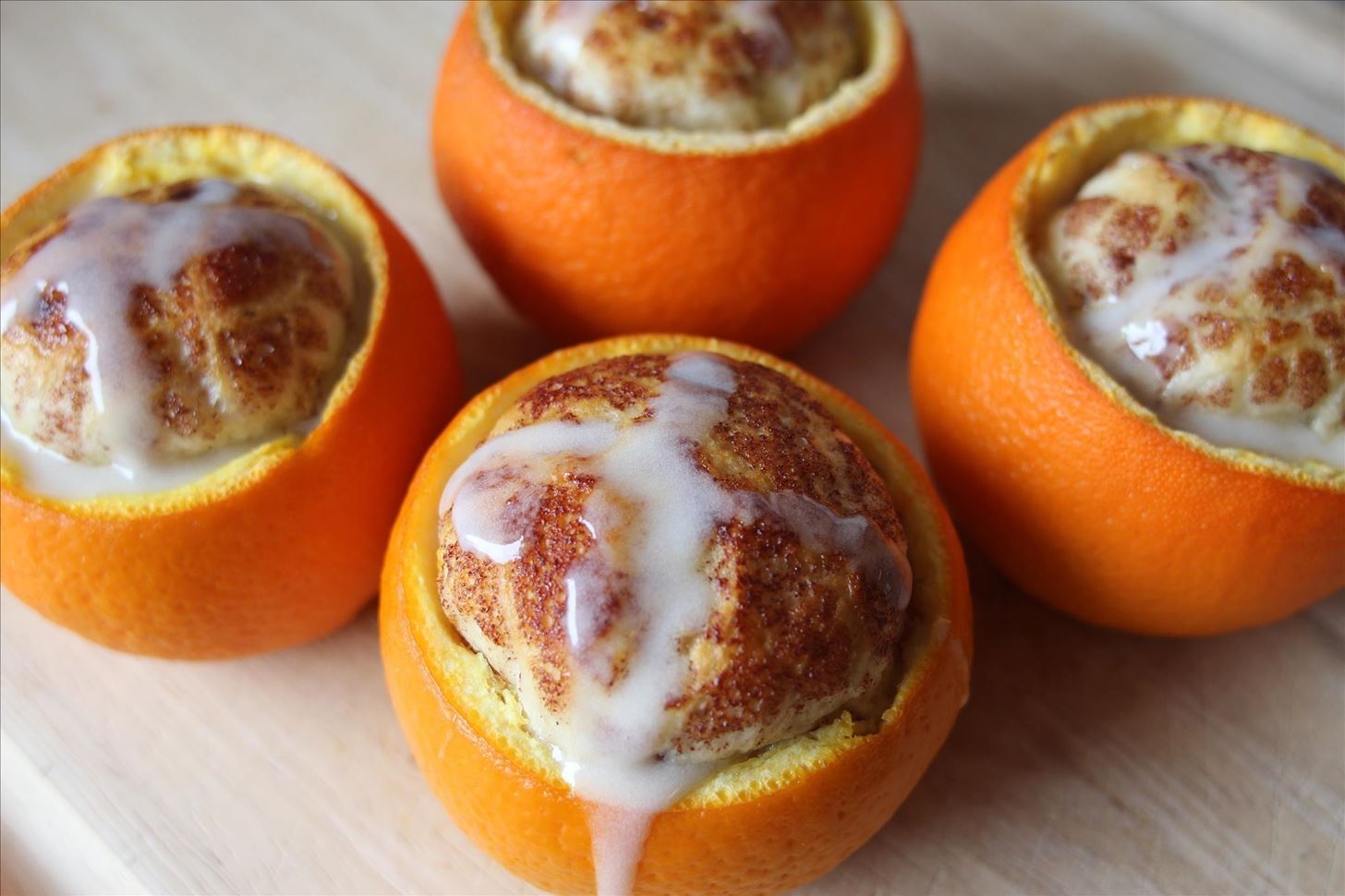 How to Bake or Grill Cinnamon Buns in Orange Peels