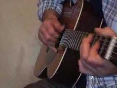 Play a John Lee Hooker-style E blues boogie on guitar