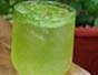 Make homemade tarragon-flavored soda with water, sugar, ice & tarragon leaves