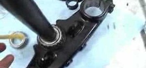 Remove the steering stem of a Kawasaki KLR650