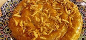 Make Moroccan M'Hanncha (almond pastry) dipped in honey