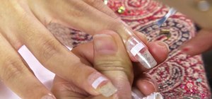 Create a white and pink striped and glittery nail look