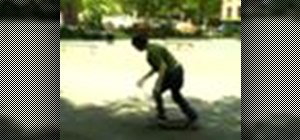 Perform a half cab kickflip on a street skateboard