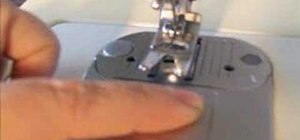 Backstitch sew on a Singer sewing machine