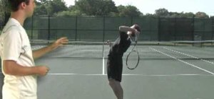 Drop the racket on a tennis serve