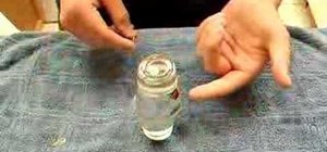 Put a penny into stacked shot glasses without spilling
