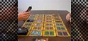 Play the card game Yu-Gi-Oh
