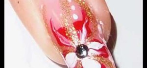 Draw a pretty floral design on your nails