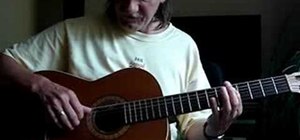 Play a G blues shuffle on acoustic guitar