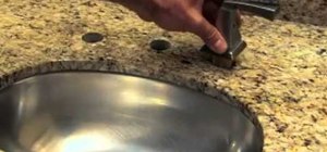 Install a new Delta single handle bathroom faucet and pop-up