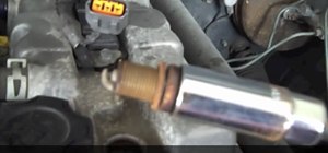 Change out the spark plugs on your car