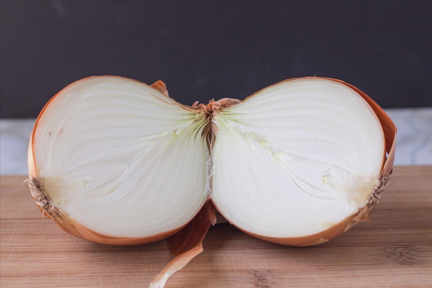 Dice an Onion Faster by Using Its Root as a Handle