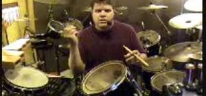 Tune a drum head on a drum set