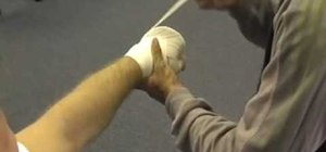 Do a basic handwrap for boxing