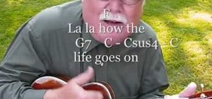 Play "Ob-la-di, Ob-la-da" by the Beatles on the ukulele