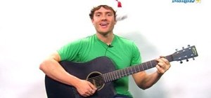 Play "We Wish You a Merry Christmas" on guitar