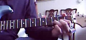 Play "The Night Before" by the Beatles on guitar