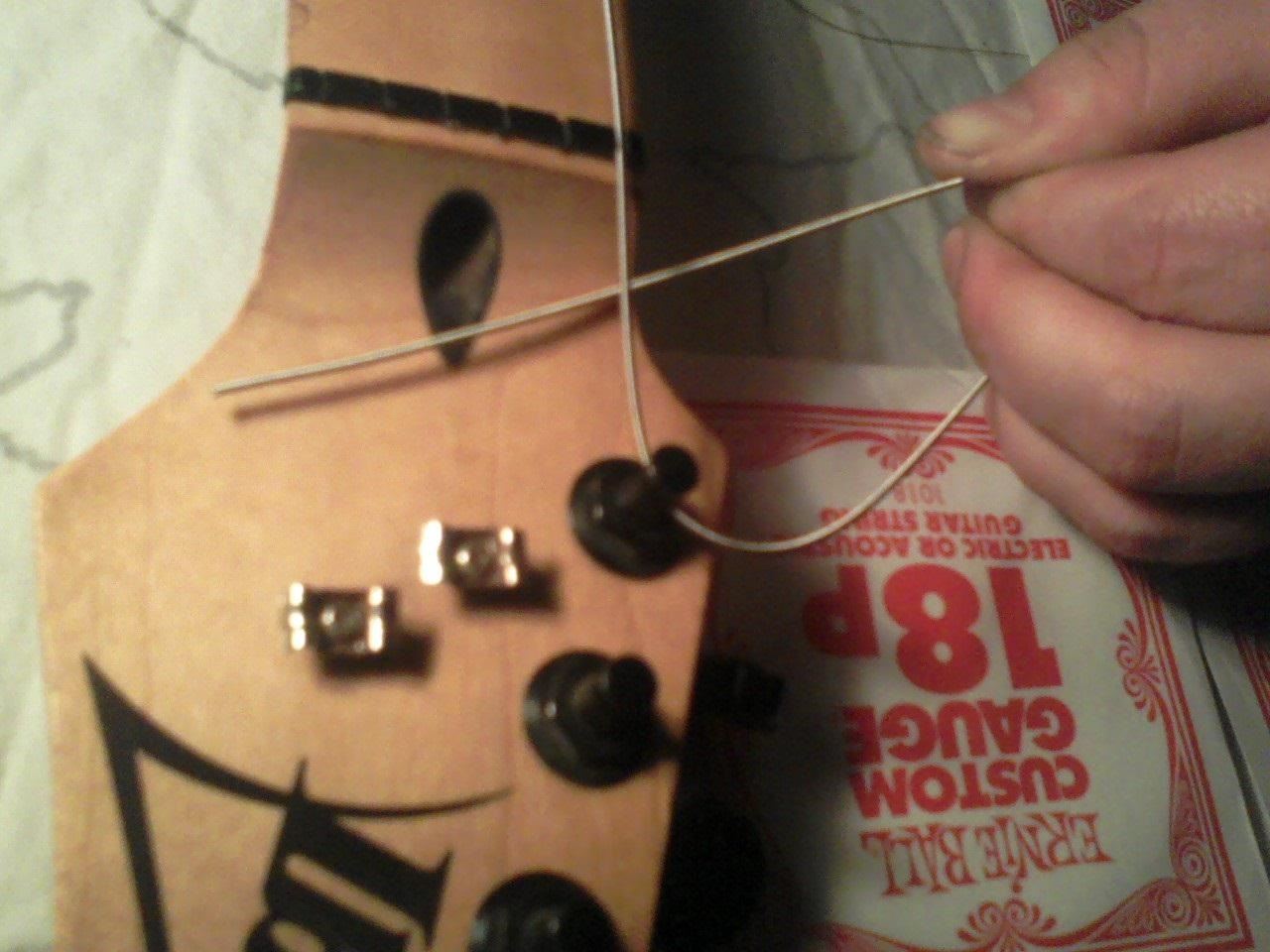 How to Restring & Tune an Electric Guitar