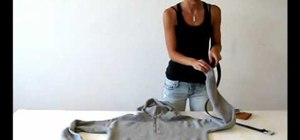 Transform a hoodie into a strap bag