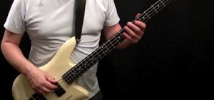 Play "She's Not There" by Santana on a bass guitar
