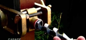 Install a deadbolt lock in a wooden door