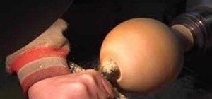 Hollow out a wooden ball form with a hollowing rig