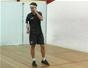 Perform a backhand corner recovery in squash