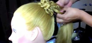 Do a multiple strand twisted bun for long hair