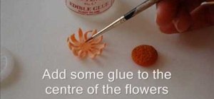 Create orange gerbera daisies out of gumpaste