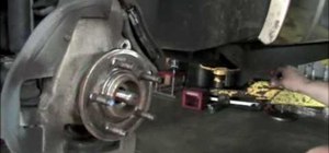 Remove and replace a front wheel bearing on a 1991 Ford Explorer