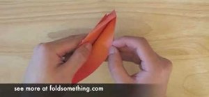 Fold an origami heart-shaped bookmark