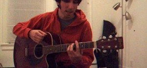 Play "Nowhere Man" by The Beatles on guitar