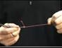 Tie a hemostat quick clinch knot when fly fishing
