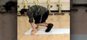 Do a slide board knee tuck ab exercise