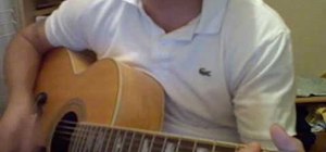 Play "Help" by The Beatles (Noel Gallagher) on guitar