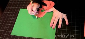 Make a 2D paper jack-o'-lantern for Halloween