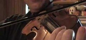 Play the violin in tune using an electronic tuner