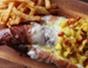 Make a heart attack inducing bacon-wrapped hot dog w/ cucumber-mustard relish