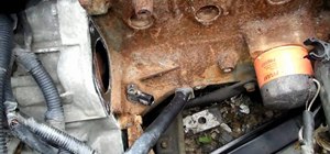 Remove the crankshaft sensor on a Nissan Sentra